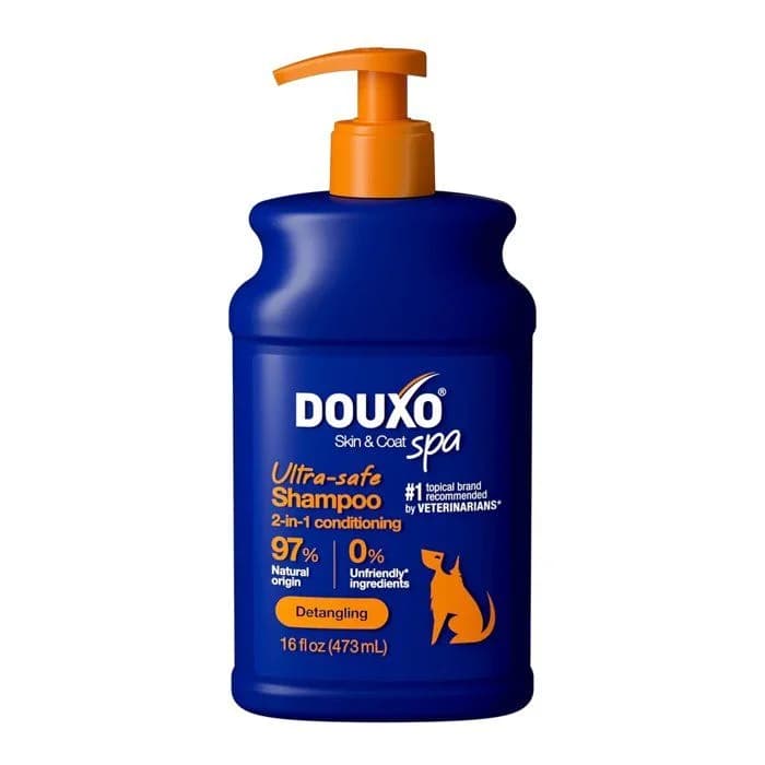 Flacon Douxo SPA Shampoing et Après-Shampoing 2 en 1 250ml orange, soin démêlant pour chien à poil long.
