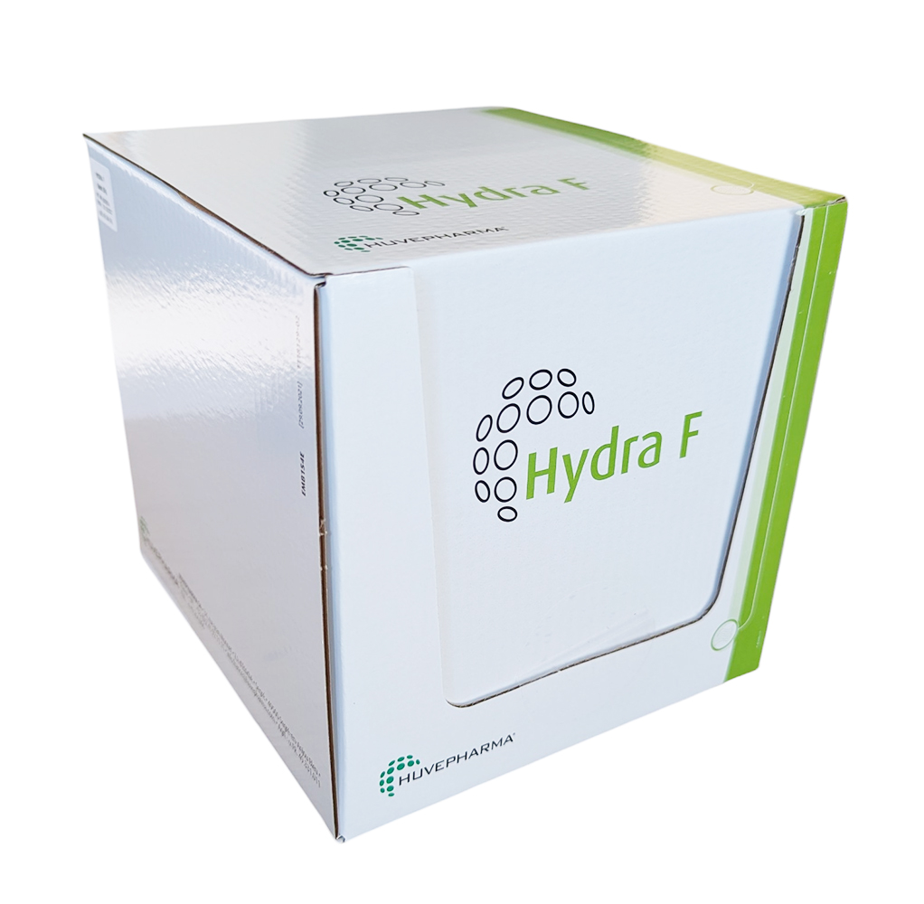 Boîte blanche et grise d'Hydra F de Huvepharma montrant un sachet individuel de galet effervescent de 50 g pour la réhydratation des veaux.