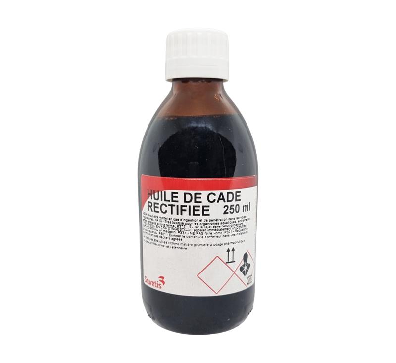 Flacon en verre ambré de 250 ml d'Huile de Cade Rectifiée pure avec bouchon blanc et étiquette de sécurité rouge.