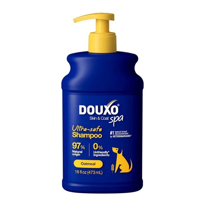 Flacon bleu Douxo SPA Shampoing Hydratant 250 ml avec pompe jaune, soin dermatologique pour chiens et chats à peau sèche.